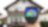 Thermoscanner mit Haus im Hintergrund