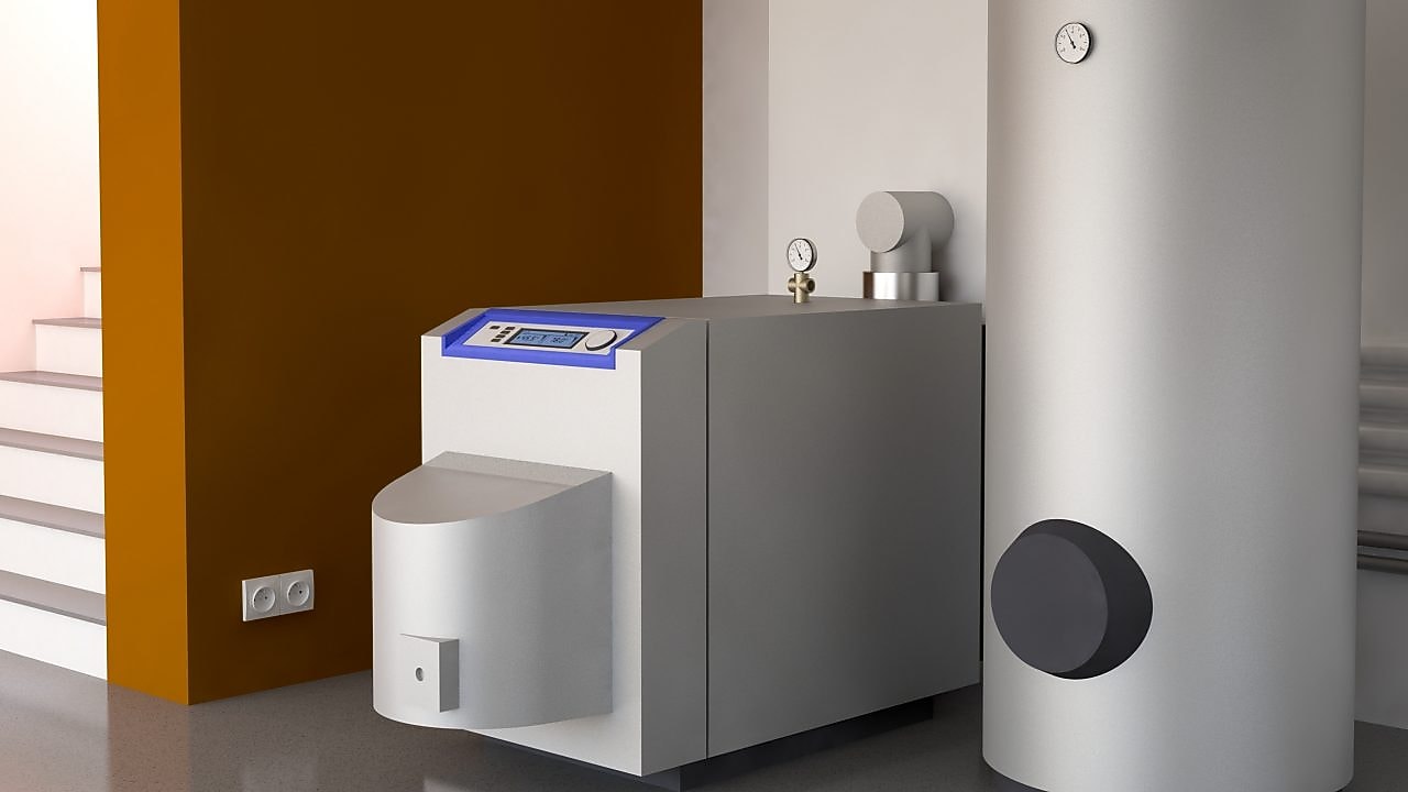 Pufferspeicher und Öl-Brennwertkessel im Kellerraum